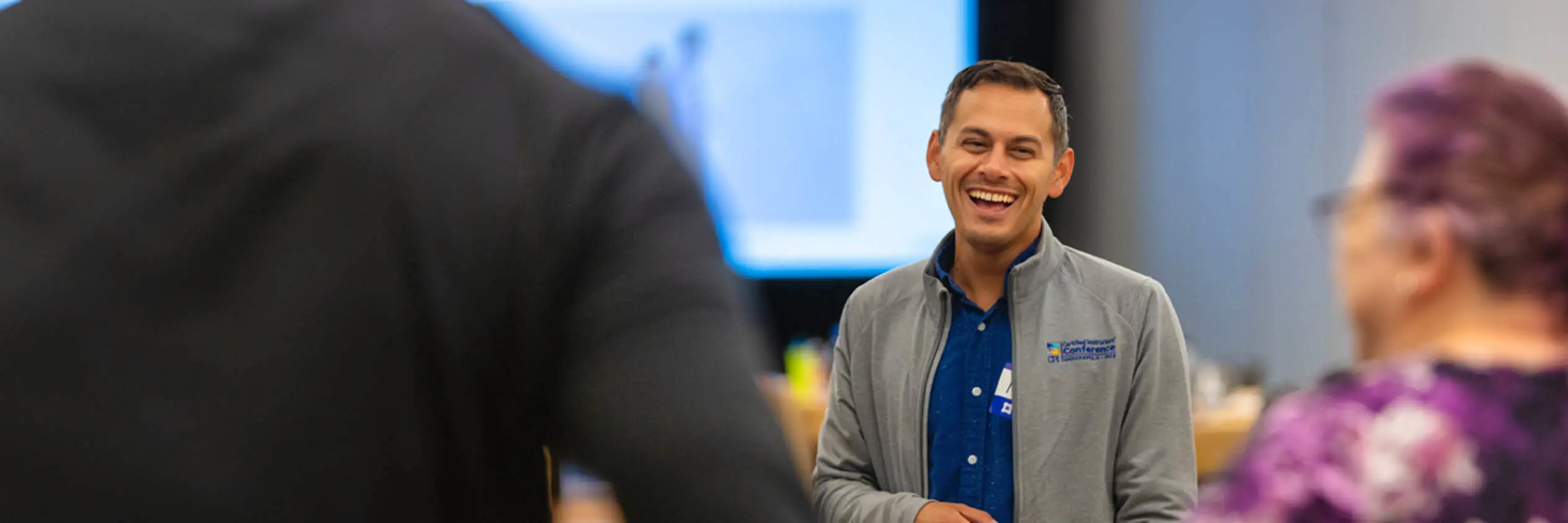 A smiling man wearing CPI clothing.