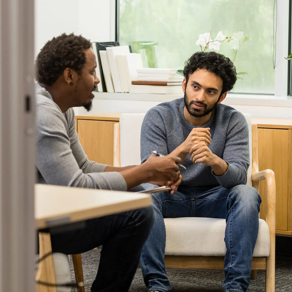 Two men having a conversation.